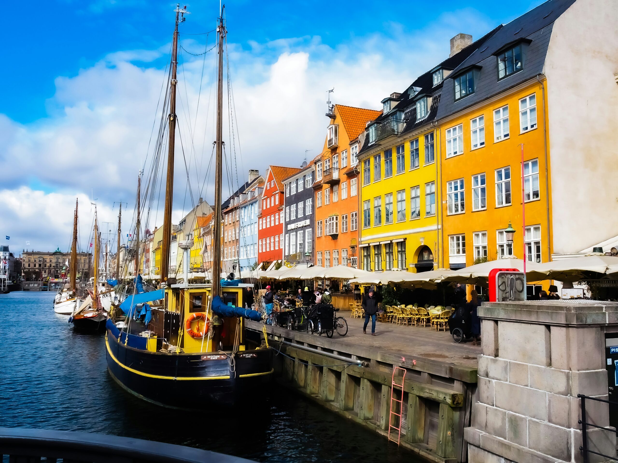 Modern architecture and clean harbor waters along the Copenhagen waterfront, reflecting sustainable city design in this Scandinavia Travel Guide.